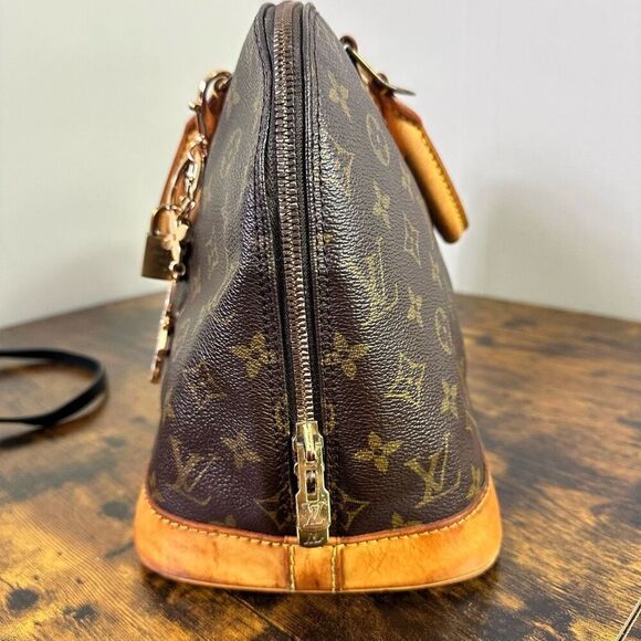 Louis Vuitton Monogram Alma Bag Satchel - Picture 16 of 16